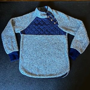 Cozy fuzzy sweater with off center button up neck